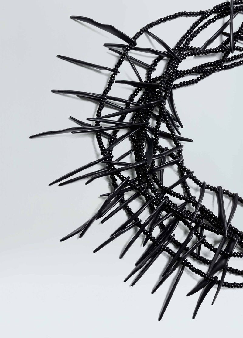COLAR BEAD SPINE